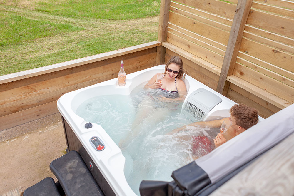 Couple-enjoying-the-private-hot-tub